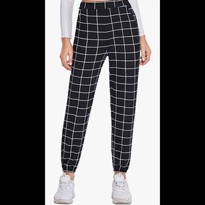 Black pants with white checkered lines